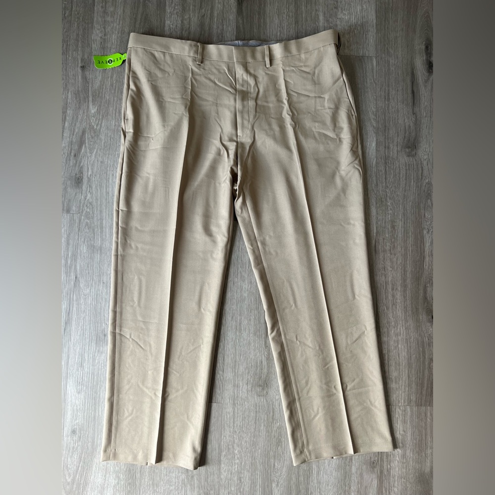 Men’s 44W x 30L khaki Haggar classic fit dress pants.